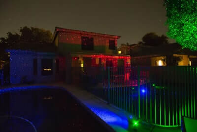 Green, Blue and Red Lasers illuminate home and yard.
